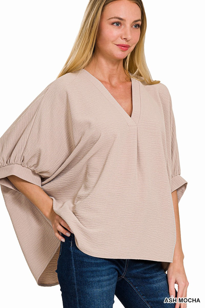 Days Like This Woven Airflow Puff Half Sleeve Top