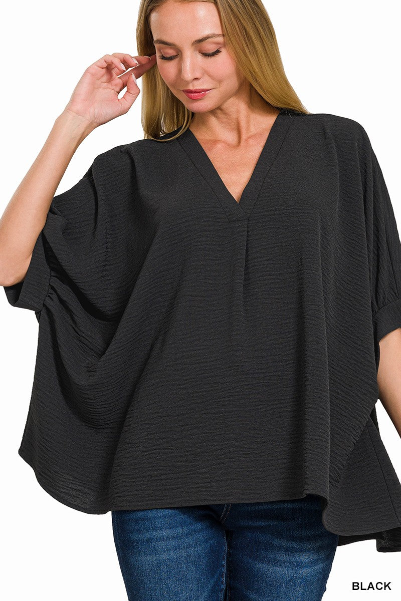 Days Like This Woven Airflow Puff Half Sleeve Top